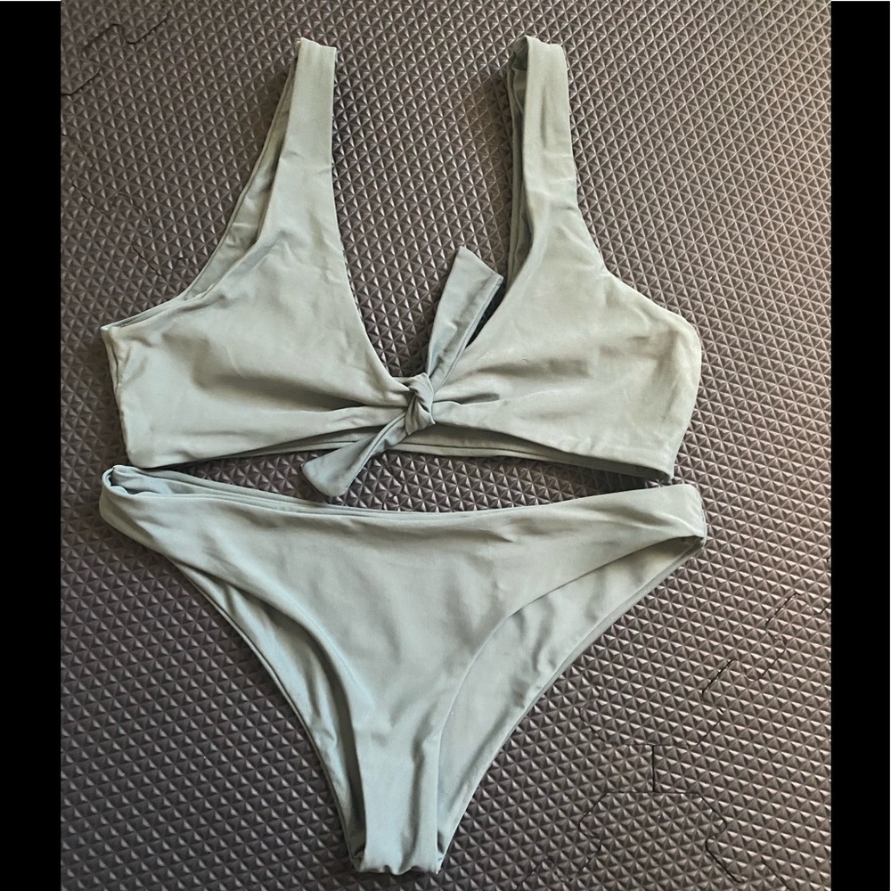 Dark green bathing suit. Worn once.